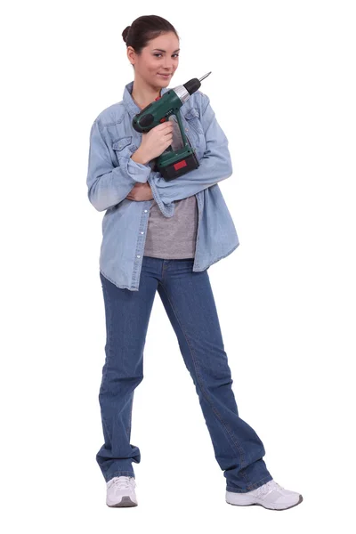 Woman with drill Stock Photo