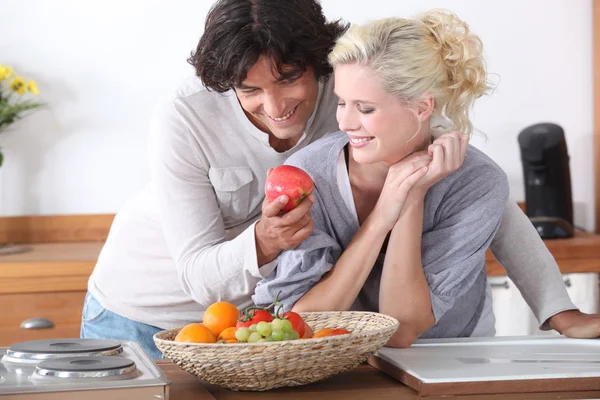 Romantic couple in the kitchen — Stock Photo, Image