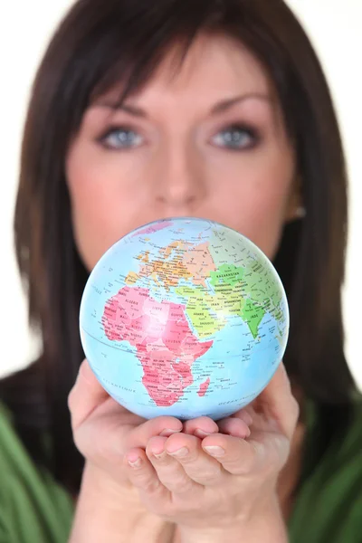Woman holding the globe — Stock Photo, Image