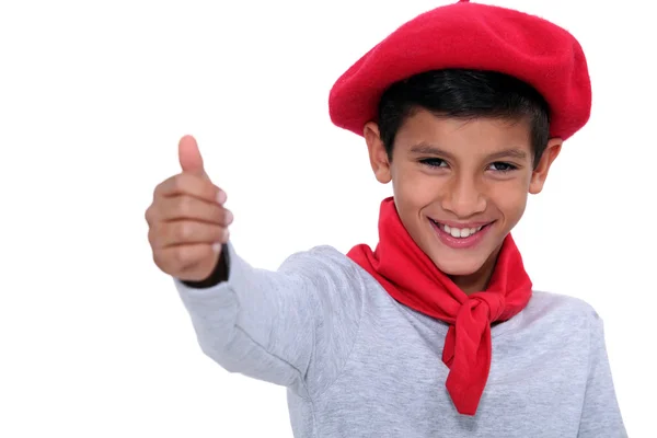 Dítě s červeným šátkem a baret — Stock fotografie