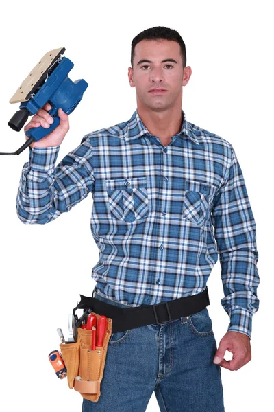Workman with a sander — Stock Photo, Image