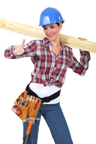 Female carpenter with wood — Stock Photo, Image