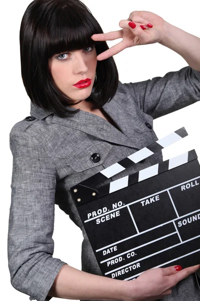 Vrouw met een Filmklapper — Stockfoto