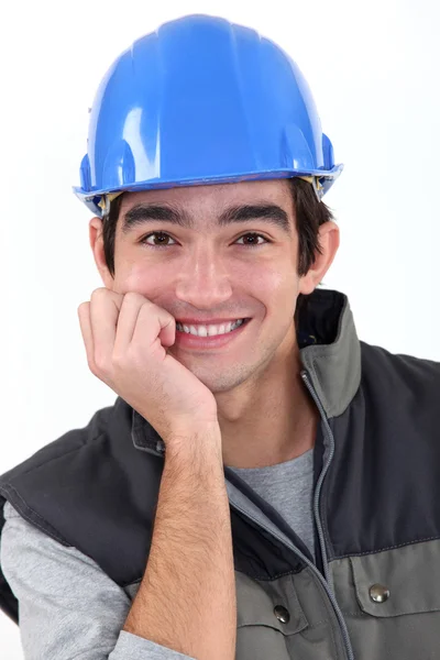 Young craftsman smiling — Stock Photo, Image