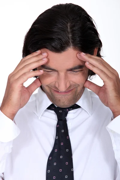 Mann mit Kopfschmerzen — Stockfoto