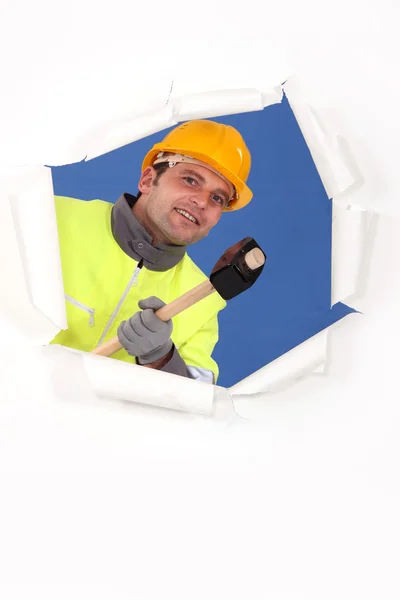 Trabajador de la construcción con un mazo — Foto de Stock