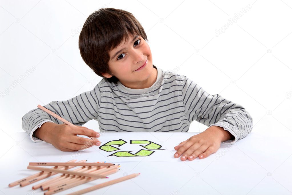 Little boy drawing logo on paper