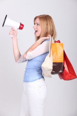 Woman announcing shopping deals clipart
