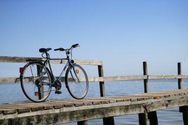 Bicycle on a jetty clipart