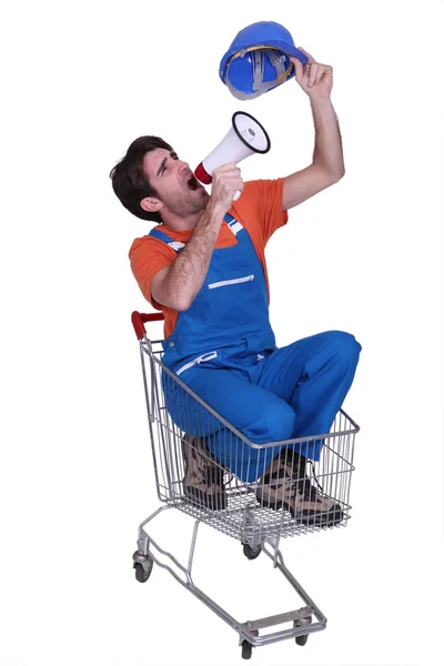Bouwvakker in een kar met een megafoon — Stockfoto