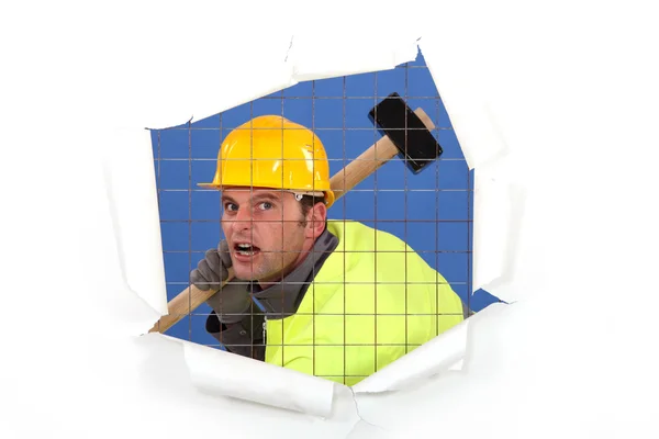 Construction worker with a sledgehammer — Stock Photo, Image