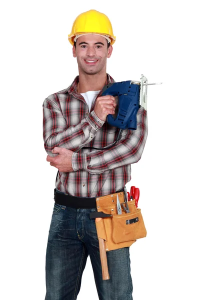 Handwerker mit einer Bohrmaschine — Stockfoto