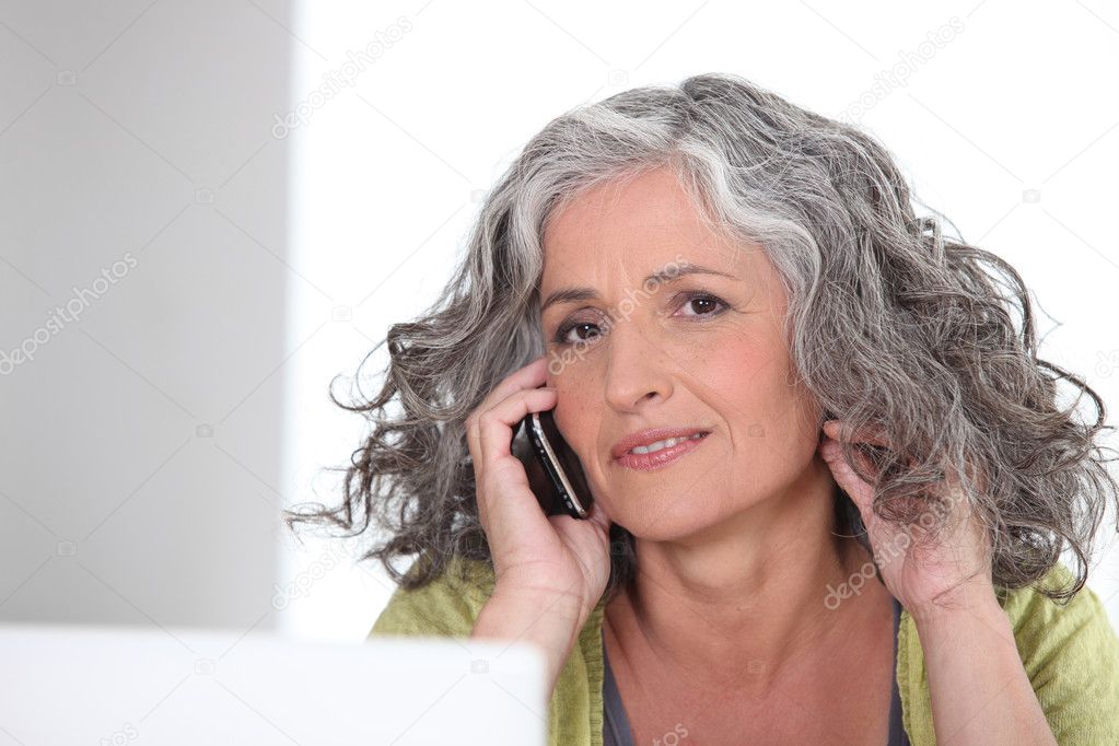 depositphotos_11510523 stock photo attractive older woman with a