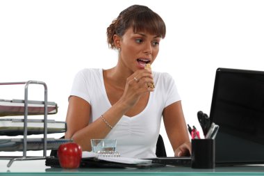 Businesswoman having a snack clipart