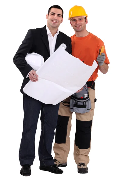 Tradesman and engineer working together — Stock Photo, Image
