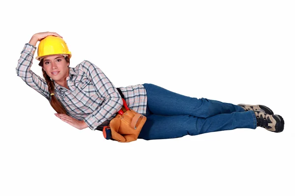 Female mason laying down — Stock Photo, Image