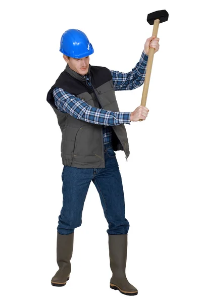 Builder using sledge-hammer — Stock Photo, Image