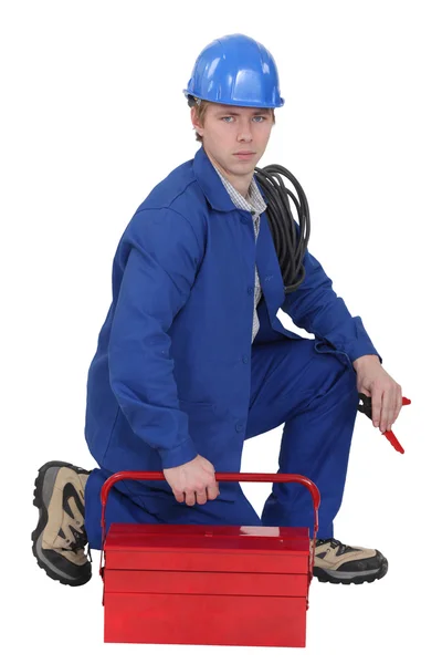 Eletricista com uma caixa de ferramentas — Fotografia de Stock