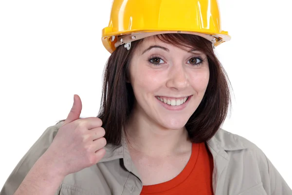 Vrouwelijke bouwer geven thumbs-up — Stockfoto
