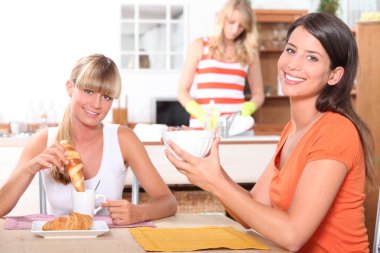 Portrait of women at breakfast clipart