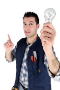 Man holding a light bulb clipart