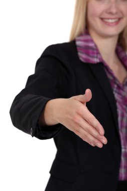 Woman holding her hand out for a handshake clipart