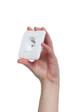 Hand holding a European electric socket clipart