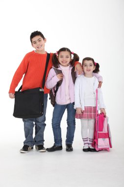 Schoolchildren with backpacks clipart