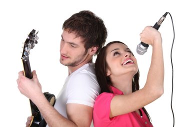 Two singing and playing guitar clipart