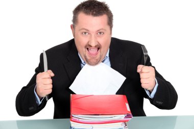 Businessman devouring a pile of paperwork clipart