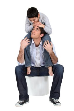 Father and son posing together clipart