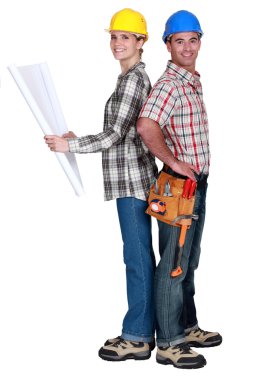 Tradespeople standing back to back clipart
