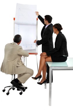 Businessman giving a presentation clipart