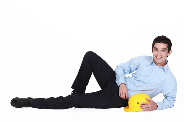 Architect laying in floor — Stock Photo, Image