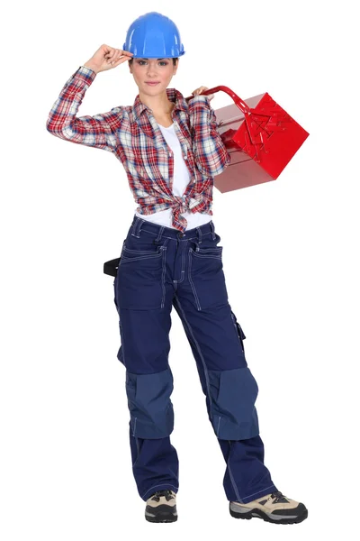 Female builder holding tool box — Stock Photo, Image