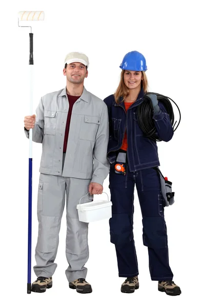 Male decorator female electrician — Stock Fotó