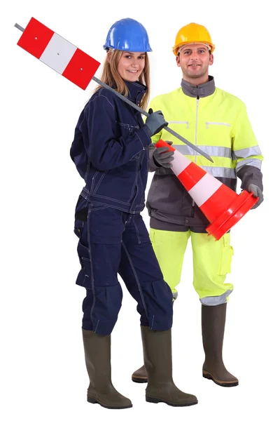 Male and female traffic workers — Stock Photo, Image
