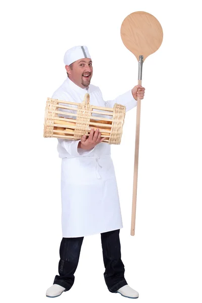 Лопата Бейкер і кошик з хлібом — стокове фото