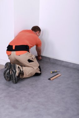 Men putting carpet clipart