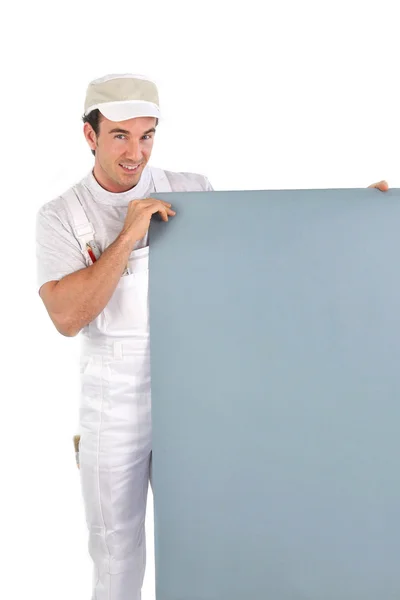 Painter with gray panel — Stock Photo, Image