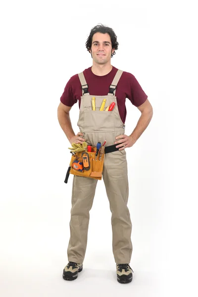 Carpenter stood with his hands on his hips — Stock Photo, Image
