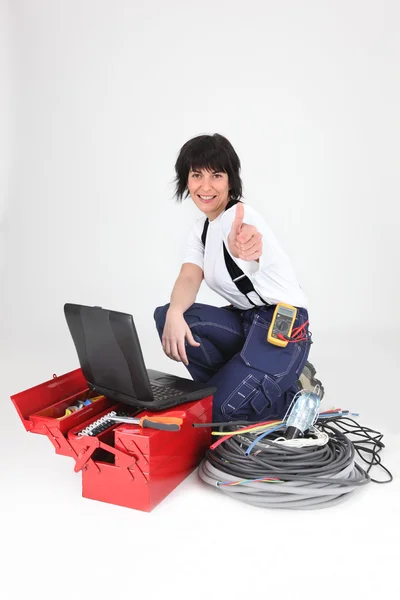 Female electrician, thumbs up — Stock Photo, Image
