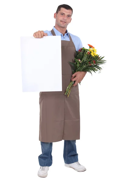 Homme tenant bouquet de fleurs — Photo