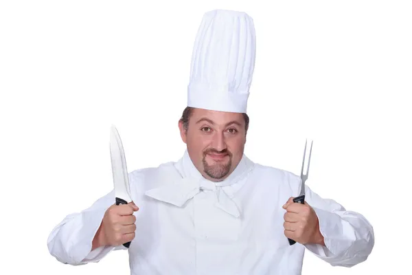 Chef segurando faca e garfo — Fotografia de Stock