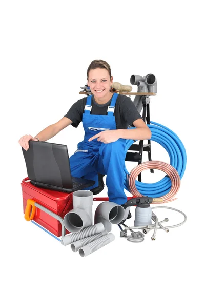 Female plumber with equipment, studio shot — Stock Photo, Image
