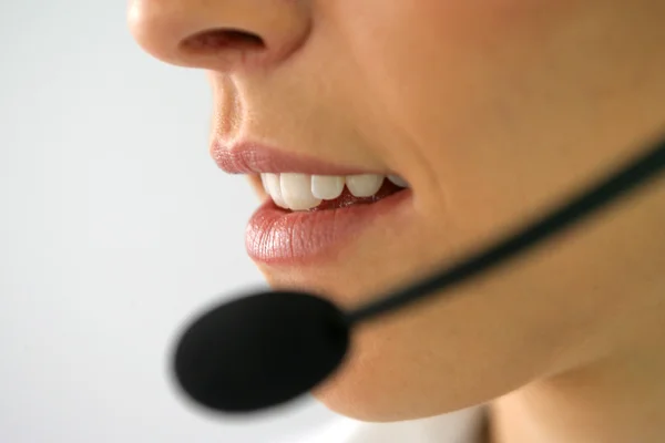 Closeup of mouth and headset — Stock Photo, Image