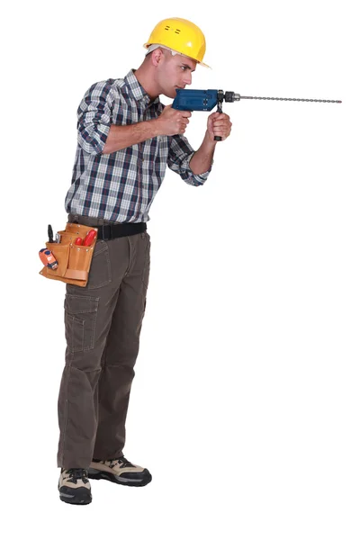 Builder with a masonry drill — Stock Photo, Image