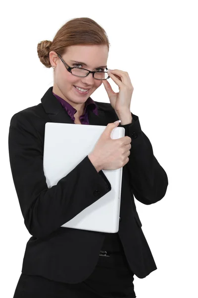 Junge Geschäftsfrau mit verspieltem Lächeln — Stockfoto
