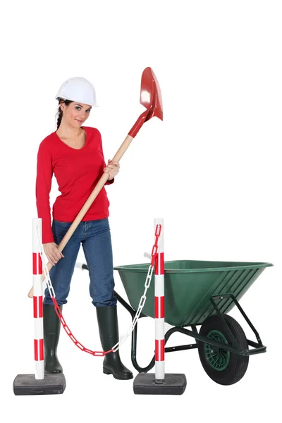 Labourer holding a spade — Stock Photo, Image