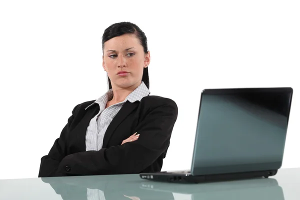 Women looking disgruntled computer Royalty Free Stock Images